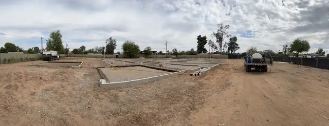 Termite pretreat truck at a new-construction foundation site in Arizona